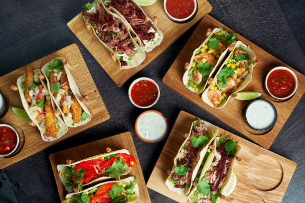 istock Set of different tacos with different fillings - with chicken, tomatoes, seafood. Menu Image 1214455521
