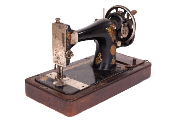 istock Antique, vintage sewing machine, isolated on white 1214455706