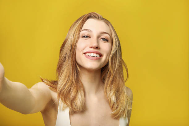 istock Young woman selfie portrait 1214456725