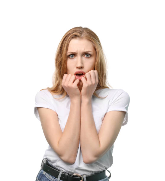 istock Frightened young woman portrait 1214456783