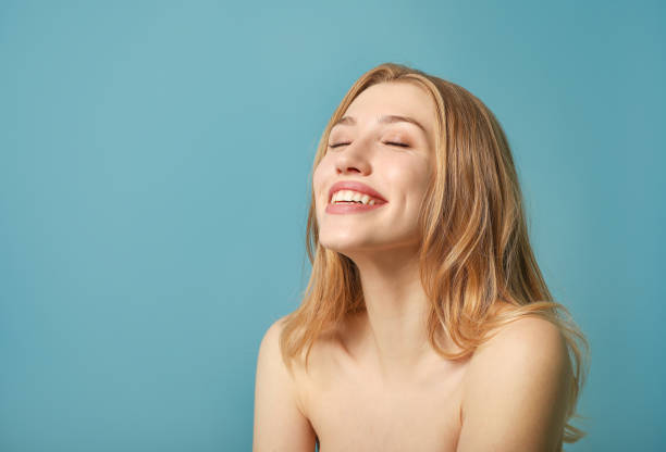 istock Smiling young woman beauty portrait 1214456980