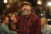 Mature man with glass of beer