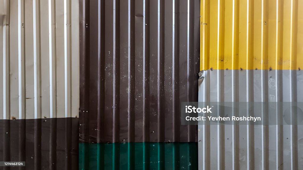 Rusty Sheets Of Corrugated Iron In Different Colors Texture Background Of  Brown Gray Yellow Green Corrugated Fence Colorful Galvanized Sheet  Background Image Of Corrugated Metal Sheets Stock Photo - Download Image  Now 