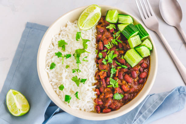 Rajma Chawal, Indian Vegan Food, Directly Above Stock Photo Spicy Vegan Healthy Indian Kidney beans Curry, Rajma Curry with Rice in a Bowl, Healthy Eating Horizontal Stock Photo kidney bean stock pictures, royalty-free photos & images
