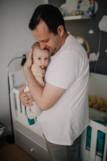 istock happy father with a baby 1214469468
