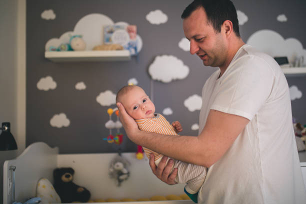 istock happy father with a baby 1214469498
