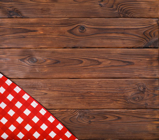istock Checkered kitchen napkin on wooden table 1214470361
