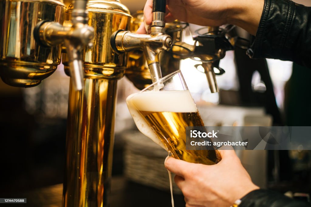 Pouring Beer Beer - Alcohol Stock Photo
