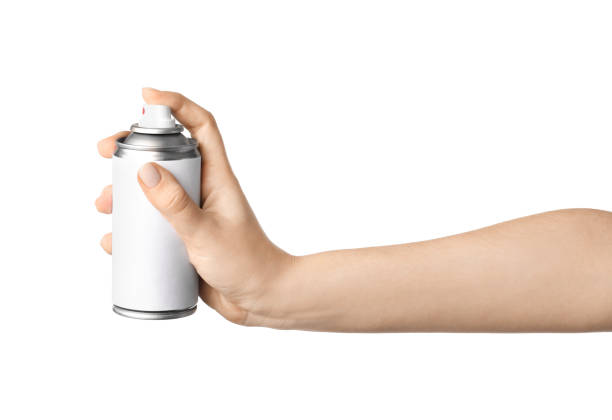 istock Spray can in female hand 1214471232