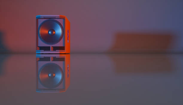 istock speaker system on a black background in blue and orange lighting 1214474188