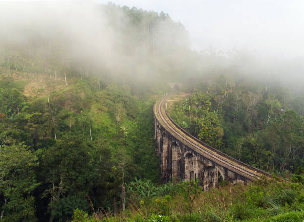 istock fog and cloud mountain valley landscape Demodara in Sri Lanka 1214474363