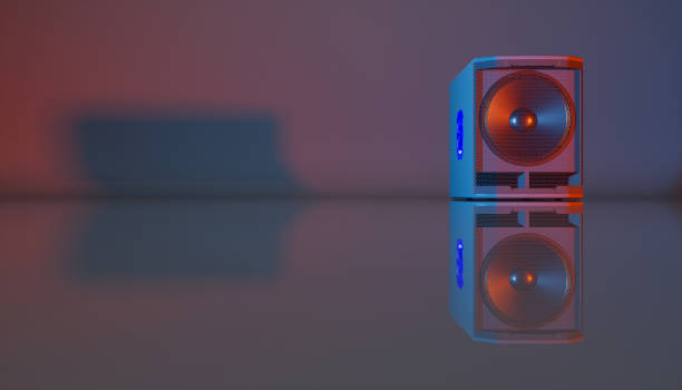istock speaker system on a black background in blue and orange lighting 1214474533