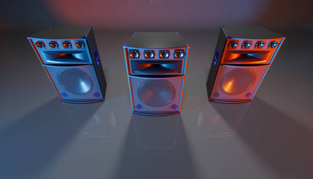 istock speaker system on a black background in blue and orange lighting 1214475383