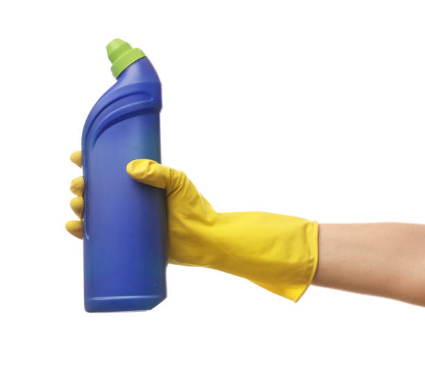 istock Hand in rubber glove with detergent 1214476591