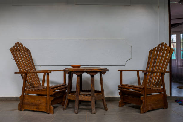 istock wooden chairs with a table in the yard 1214476644