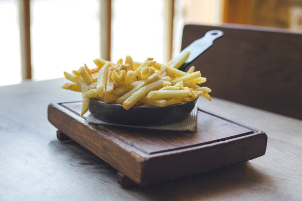 istock French fries in frying pan 1214477358