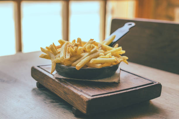 istock French fries in frying pan 1214477418