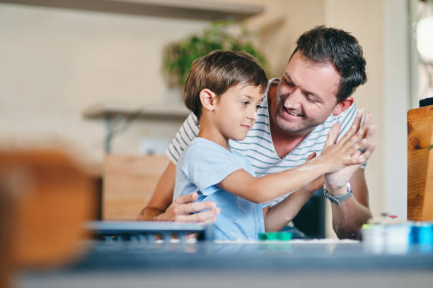 istock Who's the cooking champ? My boy is! 1214477835