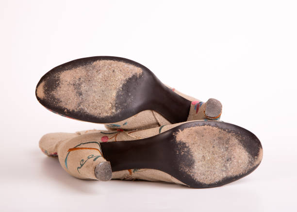 istock Leather sole in need of repair after prolonged use. 1214479652