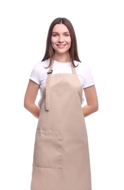 Photo of Young woman in apron portrait