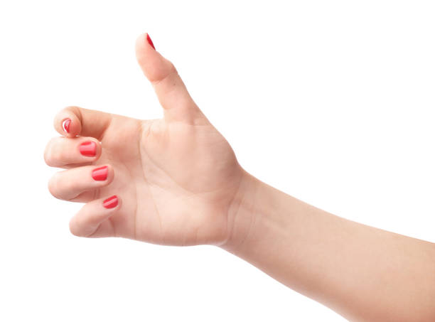 istock Female hand with red manicure 1214481593