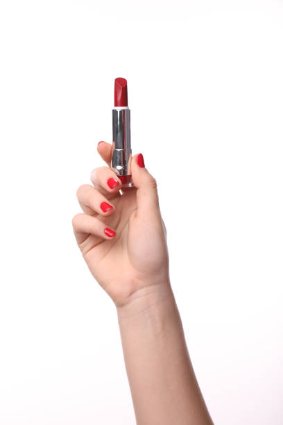 istock Female hand with red lipstick 1214481678