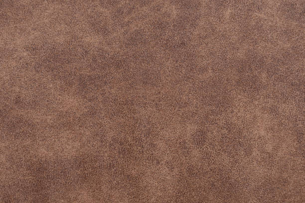 istock Brown artificial leather structure matt surface of pleather 1214482753