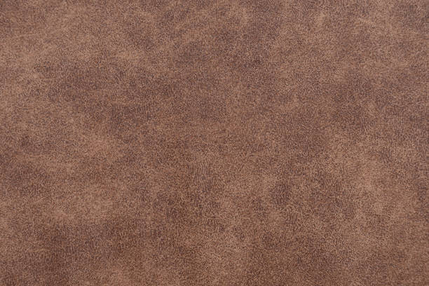 Brown artificial leather structure matt surface of pleather stock photo