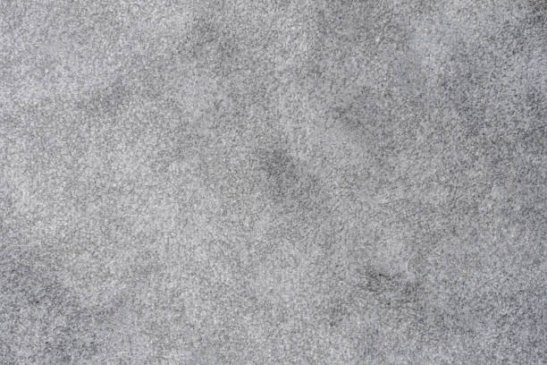 ミディアムグレーの柔らかくふわふわした構造の毛布の異なるトーンのカーペットの質感 - natural texture ストックフォトと画像