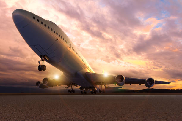 istock An airplane take-off / Landing at sunset 1214483105