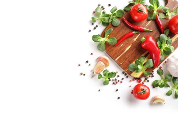 istock Vegetables and spices on wooden board 1214483328