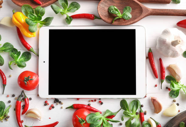 Online recipe tablet with vegetables and spices