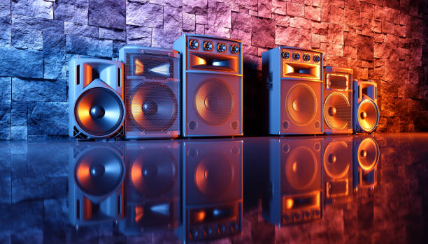 istock speaker system on a black background in blue and orange lighting 1214485500