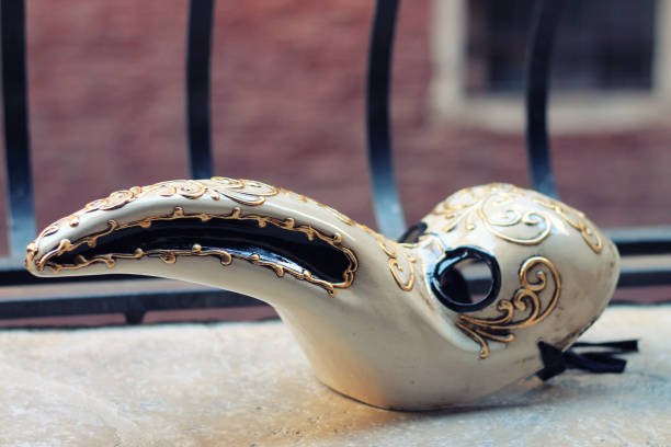 Venetian handmade plague doctor mask. A Venetian handmade plague doctor mask close up. black plague doctor stock pictures, royalty-free photos & images