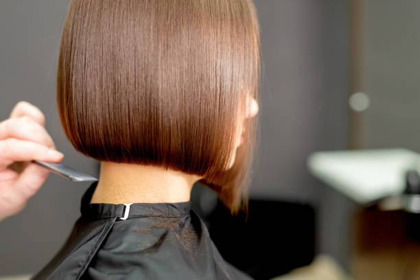 istock Combing hair of woman. 1214487549