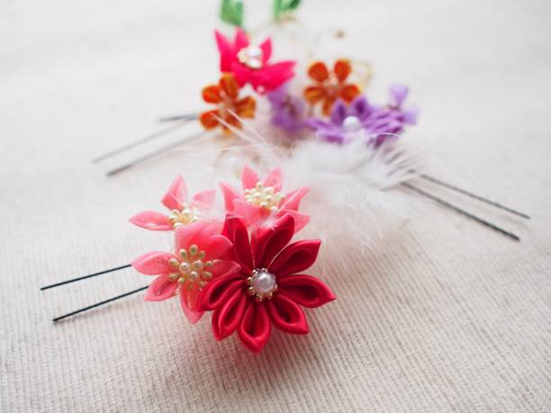 colorfull and small Japanese fabric flower colorfull and small Japanese fabric flower lacemaking photos stock pictures, royalty-free photos & images