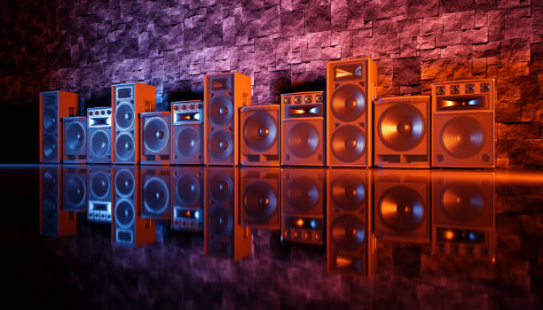 istock speaker system on a black background in blue and orange lighting 1214489123