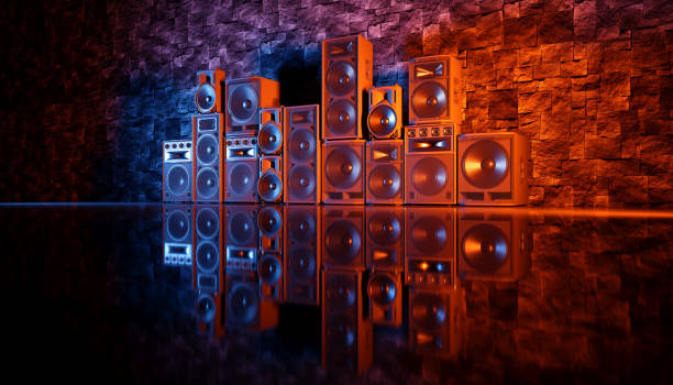 istock speaker system on a black background in blue and orange lighting 1214490400