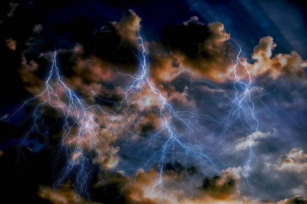 istock Dark, ominous rain clouds and lightening, dramatic thunderstorm sky view. 1214492455