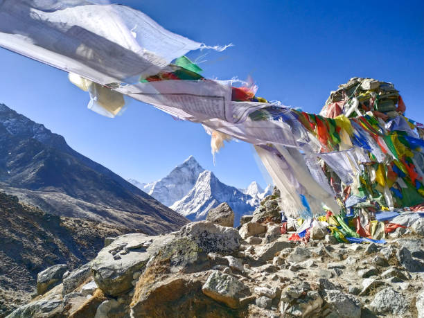 istock Colorful buddhist prayer flags and Ama Dablam mountain in the background 1214492495
