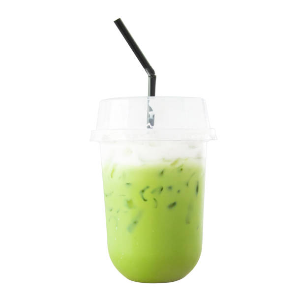 istock Iced Macha Green Tea Coffee with milk isolated white background 1214495073