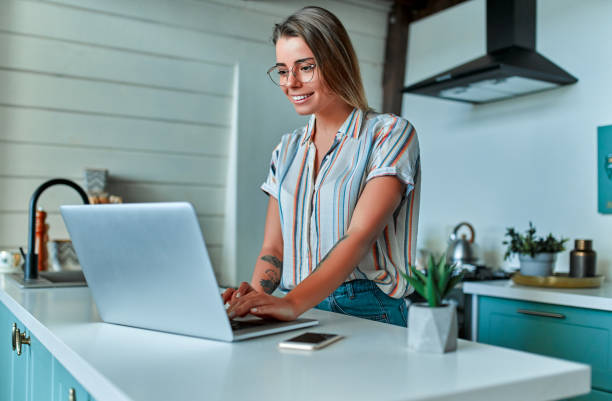 istock Woman working in the kitchen 1214495710