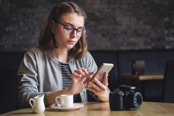 Young woman browsing on her mobile phone