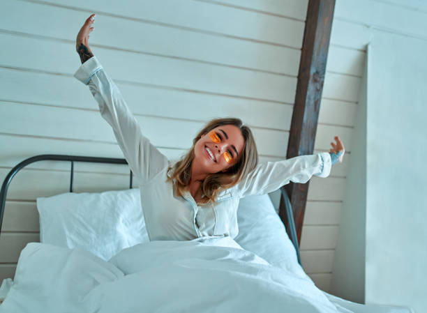 istock Woman in pajamas in bed 1214497032