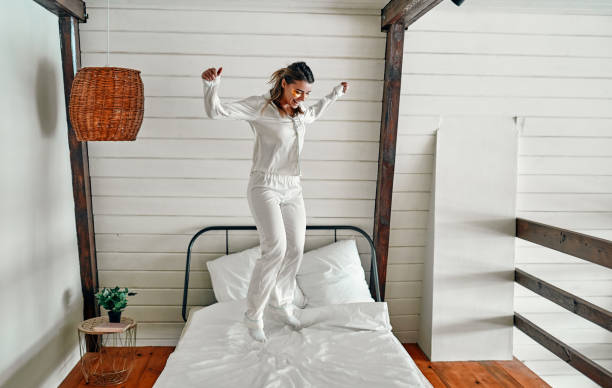 istock Woman in pajamas in bed 1214497038