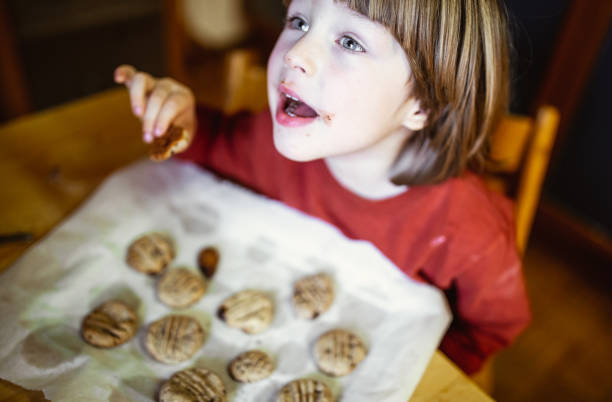 istock Toddler Boy Making cookies and having fun 1214497201
