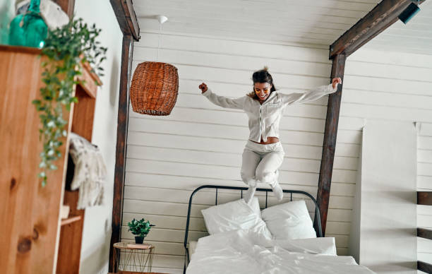 istock Woman in pajamas in bed 1214497635
