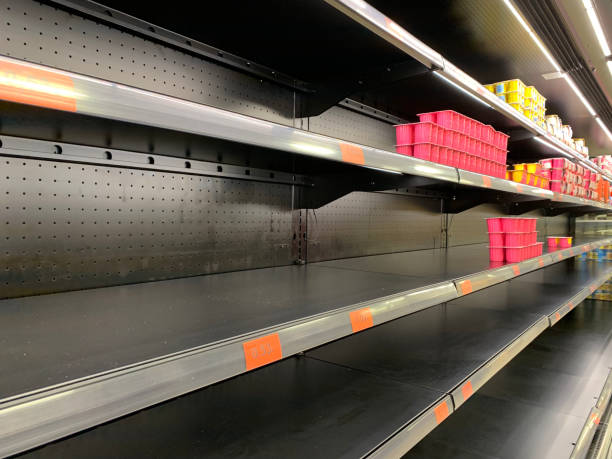 istock Empty shelves at supermarket 1214497835