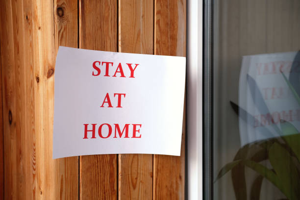 istock Quarantine warning, outbreak alert notification written on house entry. pandemic Covid -19 prevention. 1214501372