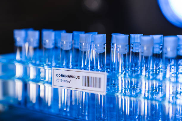 istock Coronavirus COVID-19 vials in a laboratory 1214508928